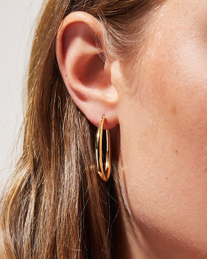 Gold Hoop Earrings - Cuidado